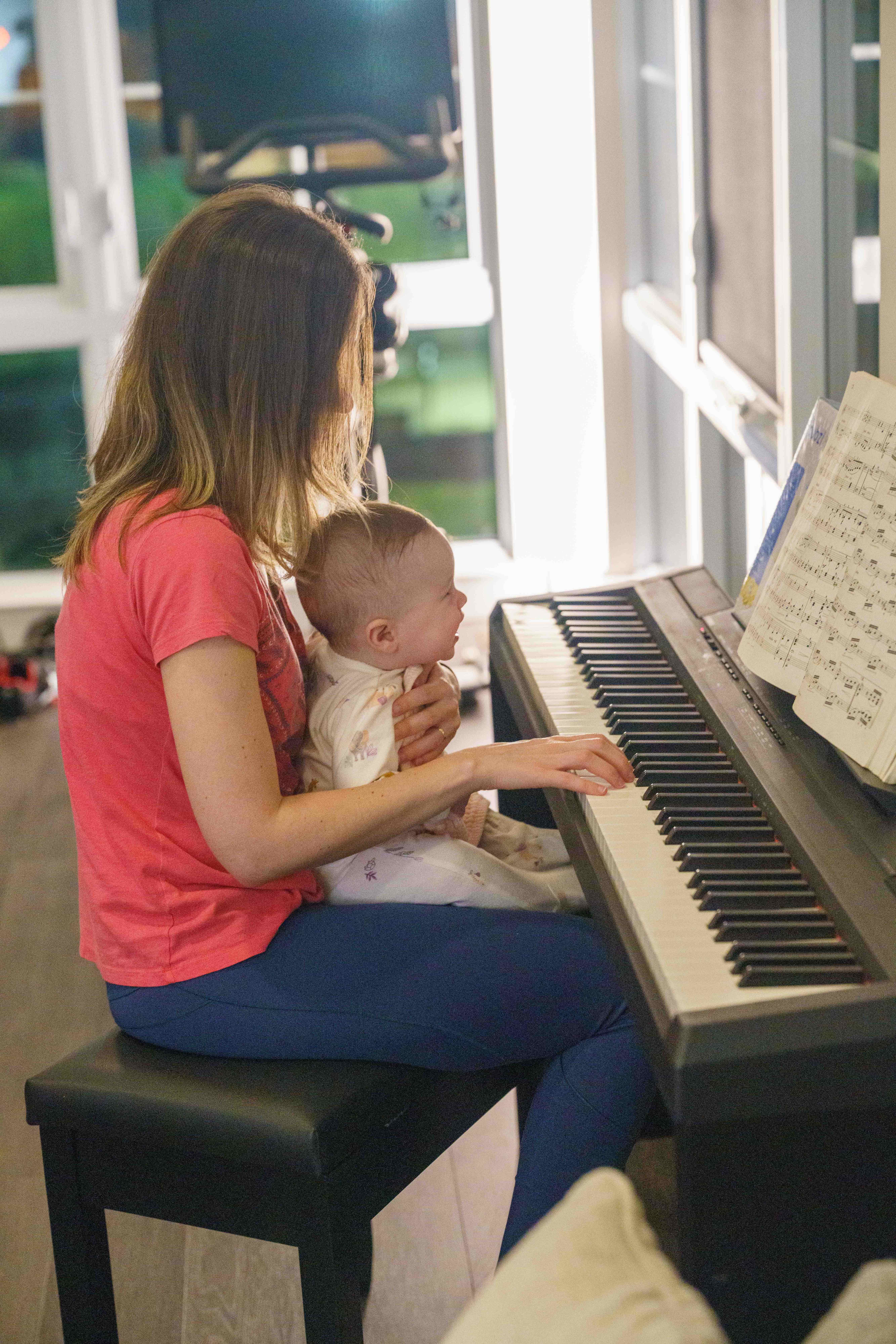 Isabella with mother at piano